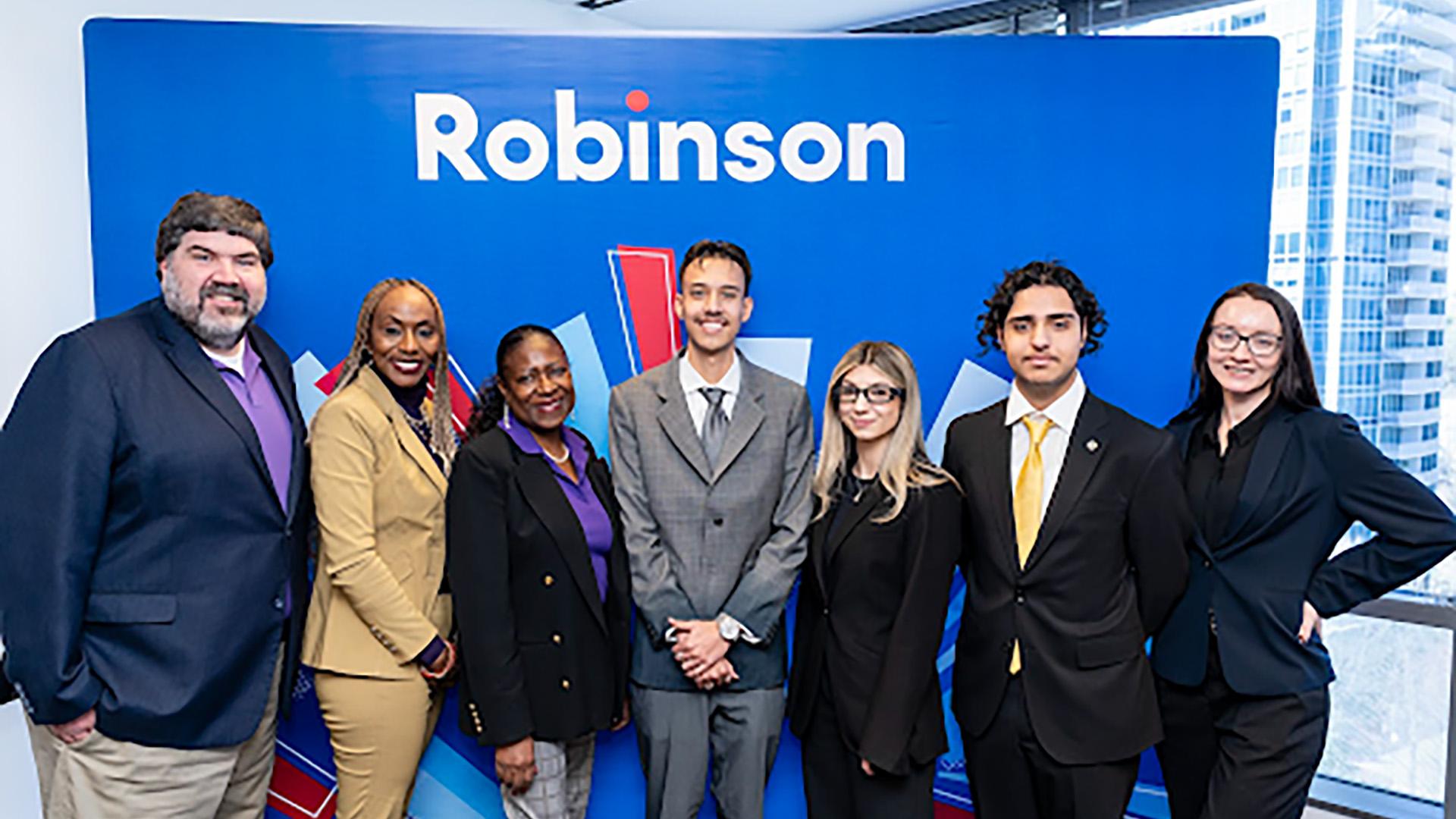 Community College of Denver staff and students wearing suits.